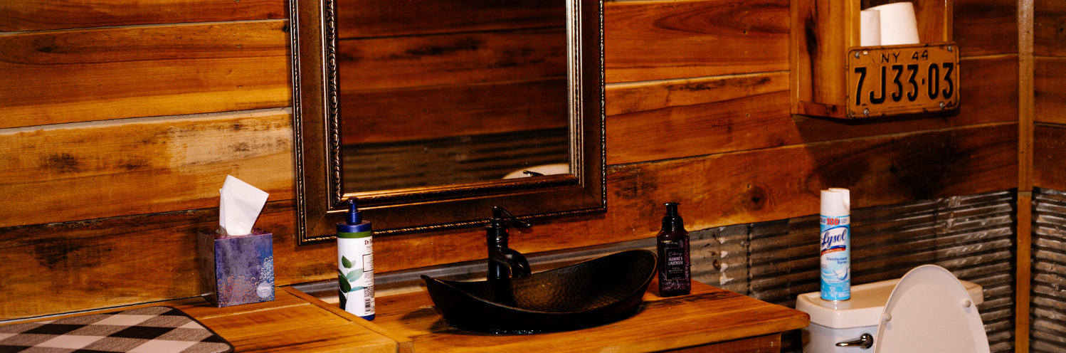 rustic bathroom at barn venue